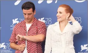  ?? Joel C Ryan / Associated Press ?? Oscar Isaac, left, and Jessica Chastain at the photo call for the film “Scenes of a Marriage” during the 78th edition of the Venice Film Festival.