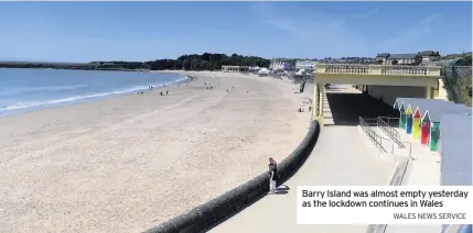  ?? WALES NEWS SERVICE ?? Barry Island was almost empty yesterday as the lockdown continues in Wales