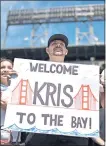  ??  ?? Kyle Paulson, of Walnut Creek, welcomes Giants newcomer Kris Bryant at Oracle Park on Sunday.