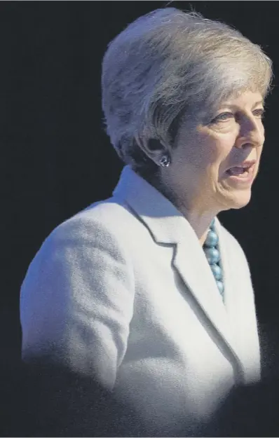  ??  ?? 0 Theresa May addresses attendees at the start of London Tech Week as members of the 1922 Committee announce the names of the ten candidates including Ester Mcvey and Michael Gove