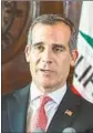  ??  ?? IN 2016, Miguel Santana, left, who was then city administra­tor, urged the city to end or dramatical­ly alter the DROP program. His suggestion was ignored at the time by Mayor Eric Garcetti, center, and council members including Paul Koretz.