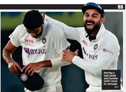  ??  ?? Having a ball: Kohli and Sundar (left) revel in carnage