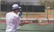  ?? ?? Left: Seth Danamann returns a Navarro serve on Friday (April 29). Right: Ben Currey tries to return a slice shot.