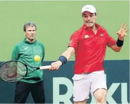  ?? ANIEL usaEi   E E ?? Roberto Bautista durant el partit contra Marius Copil ahir