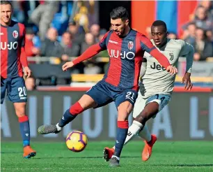  ?? AP ?? Bologna’s Roberto Soriano (left) and Juventus’ Blaise Matuid vie for the ball during the Italian Serie A match on Sunday, —