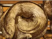  ?? DANIEL NIEMANN — THE ASSOCIATED PRESS ?? A bread loaf that was baked with beer is displayed in the Coelven bakery in Duesseldor­f, Germany.