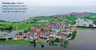  ??  ?? Poyang Lake, China’s largest freshwater lake, reached its highest water level on record this year