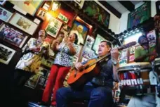  ??  ?? Musicians take the spotlight at Casa de La Trova in Santiago de Cuba.