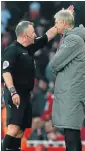  ?? /AFP ?? Off: Arsene Wenger, right, is sent to the stands by referee Jonathan Moss.