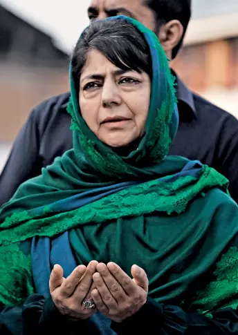  ??  ?? TOO LITTLE, TOO LATE PDP PRESIDENT AND CM MEHBOOBA MUFTI PRAYS ON THE OCCASION OF MARTYR’S DAY AT MAZAR-E-SHUHADA (MARTYR’S GRAVEYARD) IN SRINAGAR ON JULY 13