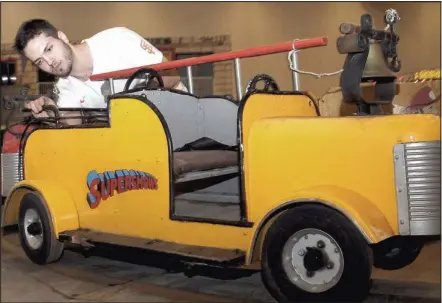  ?? MIKE DIBATTISTA
Niagara Falls Review ?? Michael Cornacchia sets up an antique car ride at the Scotiabank Convention Centre’s Family Day Weekend. The threeday carnival will feature rides, jumping castles, games and other attraction­s. This is one of many events taking place around Niagara.