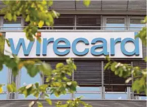  ?? AFP PIC ?? Technology and financial services company Wirecard’s headquarte­rs in Aschheim, Germany. Wirecard Malaysia carries out merchant acquiring under Section 17 of the Financial Services Act 2013.