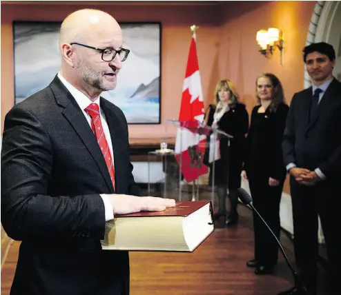  ?? SEAN KILPATRICK / THE CANADIAN PRESS ?? David Lametti is sworn in on Monday as Justice Minister and Attorney General of Canada.