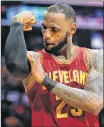  ?? AP PHOTO ?? In this 2017 file photo, Cleveland Cavaliers’ LeBron James flexes his arm after making a basket and drawing a foul call against the Los Angeles Lakers during the second half of an NBA basketball game in Los Angeles.