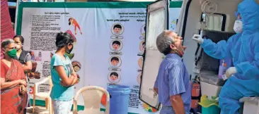  ??  ?? AT A ‘FEVER CLINIC ‘in Chennai on June 29. The surge in the number of cases in Tamil Nadu intensifie­d from the end of May after the State eased lockdown restrictio­ns.
