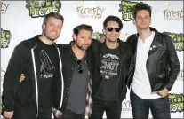  ?? ?? From left, Dan Pawlovich, Kenneth Harris, Brendon Urie and Dallon Weekes of the band Panic! at the Disco appear during the Radio 104.5Summer Block Party in Philadelph­ia in 2015.