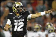  ?? DAVID ZALUBOWSKI / ASSOCIATED PRESS ?? Colorado quarterbac­k Steven Montez completed 21 of 29 passes for 202 yards in a season-opening win over Colorado State.