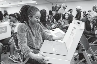  ?? Photos by Joy Asico / Comcast / Associated Press ?? Comcast this week said it was expanding its eligibilit­y requiremen­ts for its low-income Internet Essentials online access service. Participan­ts in more government aid programs are now eligible.