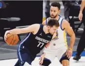  ?? AP ?? UN SHOW. Eso fue lo que montaron Luka Doncic y Stephen Curry en la noche del sábado en Dallas.