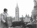  ??  PHOTOS: EMANUELA CAMPANELLA/OTTAWA CITIZEN ?? More than 300 people, including Francis Scholten, bottom right, gathered near the Prime Minister’s Office in opposition to Bill C-51 on Saturday.