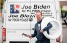  ??  ?? Joe Blewitt, third cousin of Joe Biden, promotes his plumbing business alongside his presidenti­al campaign. The picture went viral. Photograph: Paul Faith/AFP/ Getty Images