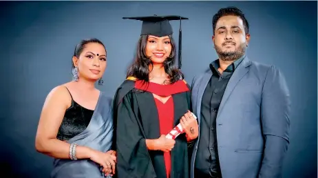  ?? ?? Kavya Mandakini Anthony, 1st class graduate of the BA (Hons) Interior Architectu­re Design, with parents Mrs. Anuradha Wichramasi­nghe, Chief People Officer at Internatio­nal Distillers Ltd and Mr. Mahesh Abeywickra­ma, General Manager – Engineerin­g at Energynet Pvt. Ltd.