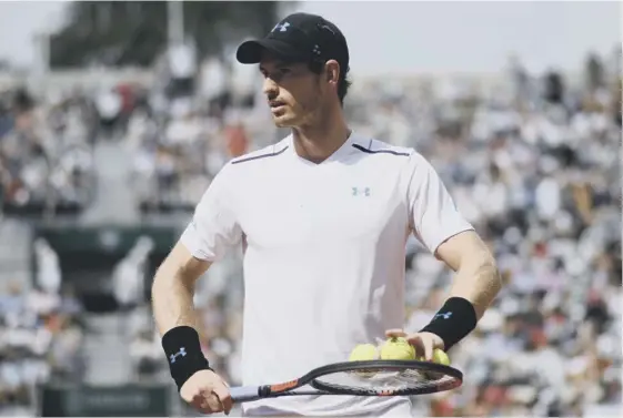  ??  ?? Andy Murray battled his way through four sets against Martin Klizan on Thursday and is playing better than he was in the lead up to the French Open.