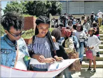  ?? Picture: EUGENE COETZEE ?? DOING THE FOOTWORK: Asemahle Maliza, left, 18, who wants to study IT, and Sisipho Mapuma, 17, who wants to study accounting, wait to enrol at the NMU south campus