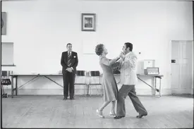  ??  ?? DANCING MASTER: Ted Van Rensburg watches two of his ballroom pupils, swinging to a record of Victor Sylvester and his Orchestra, in the Moths’ Hall at the old Court House, Boksburg, in 1980. Photograph by David Goldblatt