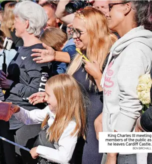  ?? BEN BIRCHALL ?? King Charles III meeting members of the public as he leaves Cardiff Castle.