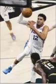  ?? AP photo ?? Tobias Harris of the 76ers drives to the basket during the first half Friday.