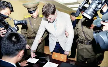  ?? KCNA VIA KNS/AFP ?? US student Otto Frederick Warmbier attends his trial at the Supreme Court in Pyongyang on March 16, 2016, after being arrested for committing hostile acts against North Korea.