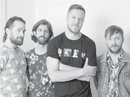  ??  ?? Imagine Dragons, from left, Daniel Platzman, Wayne Sermon, Dan Reynolds and Ben McKee.