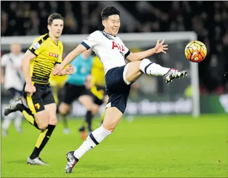  ?? — GETTY IMAGES FILES ?? Son Heung-min controls the ball for Tottenham during a Dec. 28 Premier League match against Watford. The talented attacker is a player to watch as the Spurs host Leicester City on Sunday.