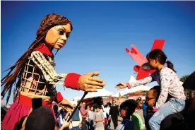  ?? Photograph: José Luis González/Reuters ?? Little Amal at the Plaza de la Mexicanida­d in Ciudad Juárez, Mexico, on 26 October.