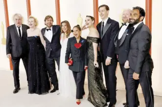  ?? – AFP PHOTO ?? Dolly with (from left) Zlatko Burić, Sunnyi Melles, director Ruben Ostlund, Sina Gorcz, Vicki Berlin, Harris Dickinson, Henrik Dorsin, and Arvin Kananian at the 95th Annual Academy Awards in Hollywood, California.