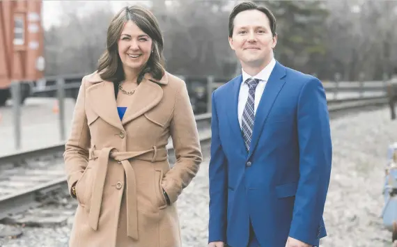  ?? BRENT CALVER ?? Premier Danielle Smith and Minister of Transporta­tion and Economic Corridors Devin Dreeshen announced plans for a passenger rail network at Heritage Park on Monday.