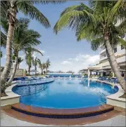  ?? CONTRIBUTE­D BY CONDADO VANDERBILT HOTEL ?? Cool off in the main pool at Condado Vanderbilt Hotel.