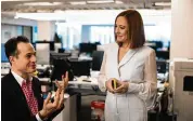  ?? ALYSSA SCHUKAR / NYT ?? Jen Psaki talks with producer Will Rabbe at MSNBC’S studio in Washington on Feb. 15. Her weekly talk show on the network is set to debut March 19.