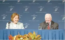  ?? AP-Yonhap ?? Former President Jimmy Carter, right, and Rosalynn Carter talk about the future of the Carter Center and their global work during a town hall, in Atlanta, Tuesday.