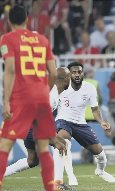  ??  ?? 0 England’s Danny Rose looks on helplessly as Adnan Januzaj fires off a curling shot which sailed into