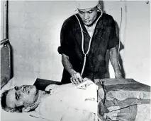  ??  ?? John McCain is examined in a Hanoi hospital after being shot down and captured.