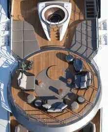  ??  ?? BELOW FROM LEFT: Intimate outdoor terrace of the master suite; upper deck of the yacht