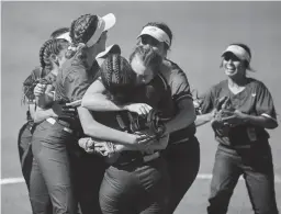  ?? PHOTOS BY ALEX GOULD/THE REPUBLIC ?? Sabino players celebrate their 3A state championsh­ip after defeating Winslow 8-0 at Farrington Softball Stadium.
