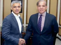  ?? APP ?? Sadiq Khan shakes hands with Shahbaz Sharif in Lahore. —