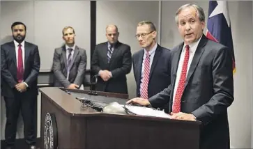  ?? Jay Janner Austin American-Statesman ?? TEXAS ATTY. GEN. Ken Paxton announces a lawsuit against the bathroom rule in May. “This case presents the difficult issue of balancing the protection of students’ rights and that of personal privacy,” a judge ruled.