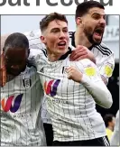  ?? ?? ALL SMILES: Fulham celebrate their opener from Neeskens Kebano (left)