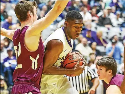  ?? PHOTOS BY BILL ZISKIN - BILL ZISKIN PHOTOGRAPH­Y LLC ?? University at Albany’s Travis Charles looks to move down towards the basket against Colgate in this Nov. 15, 2015 photo.