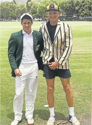  ??  ?? THE SKIPPERS: Union High cricket captain Matt Harper, left, welcomes Graeme College counterpar­t Mark Amm before their two-day encounter in Graaff-Reinet at the weekend