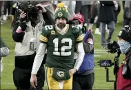  ?? MORRY GASH — THE ASSOCIATED PRESS FILE ?? Packers quarterbac­k Aaron Rodgers walks off the field after the NFC championsh­ip game against the Buccaneers on Jan. 24 in Green Bay, Wis.